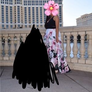 Black top, mesh sides, white with pink flower bottom. Size 6